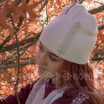 Balta cepurīte ar Saules jostu